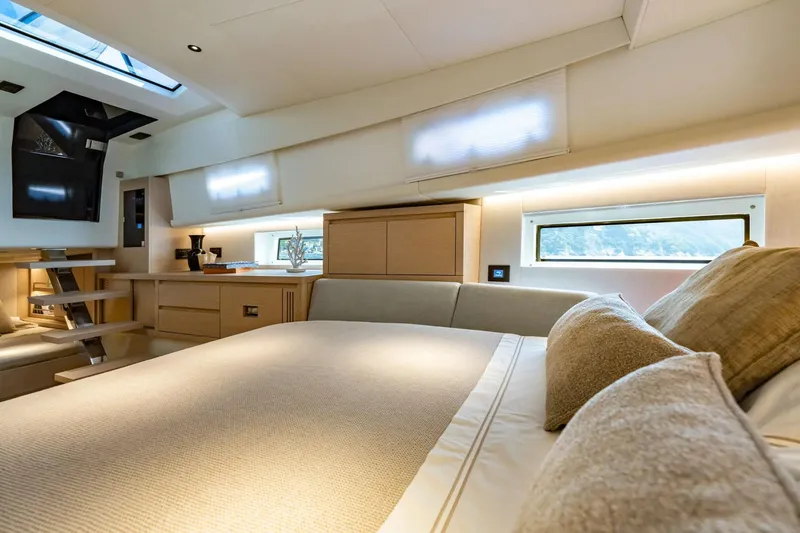 Slide: The Image of Luxurious interior of 2026 Pardo Yachts P43, featuring elegant bedding and modern design. - 5