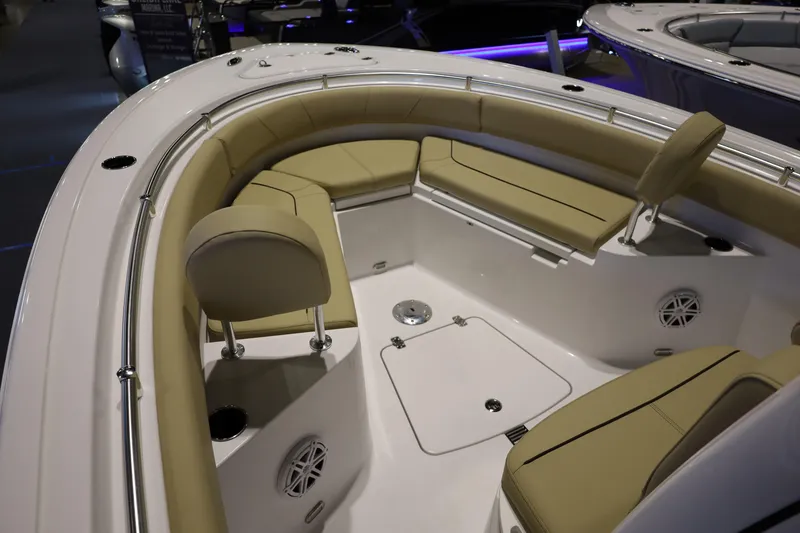 Slide: The Image of 2026 Sportsman Heritage 231 Center Console boat interior with cushioned seating. - 12