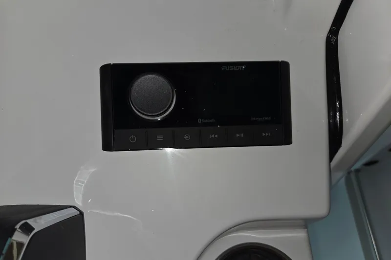 Slide: The Image of Fusion audio system on 2026 Sportsman Heritage 231 Center Console boat dashboard. - 17