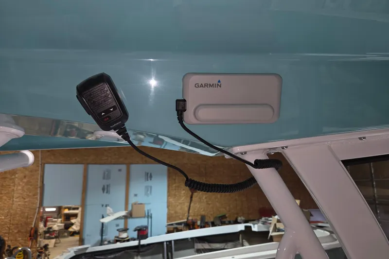 Slide: The Image of 2026 Sportsman Heritage 231 Center Console with Garmin marine electronics installed. - 18