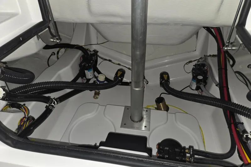Slide: The Image of 2026 Sportsman Heritage 231 Center Console interior wiring and plumbing setup. - 20