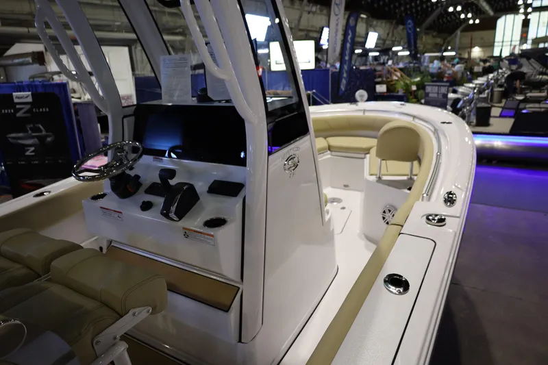 Slide: The Image of 2026 Sportsman Heritage 231 Center Console boat interior at a boat show. - 7