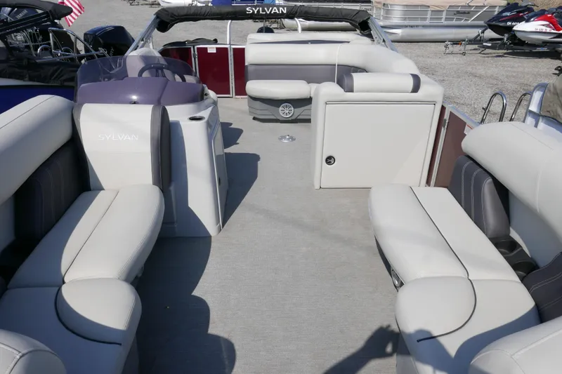 Slide: The Image of 2021 Sylvan Mirage 8520 Cruise pontoon boat interior with spacious seating and modern design. - 3