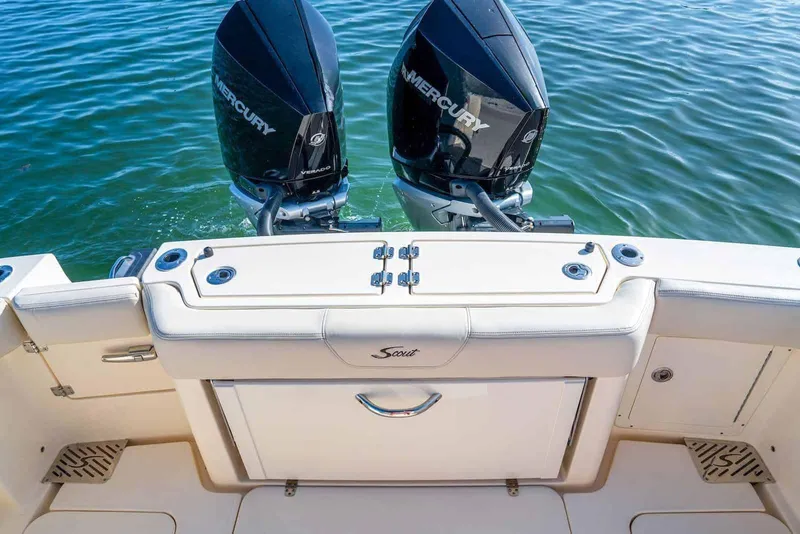 Slide: The Image of Manufacturer Provided Image: 2026 Scout 288 LXF boat with dual Mercury engines on calm water. - 11