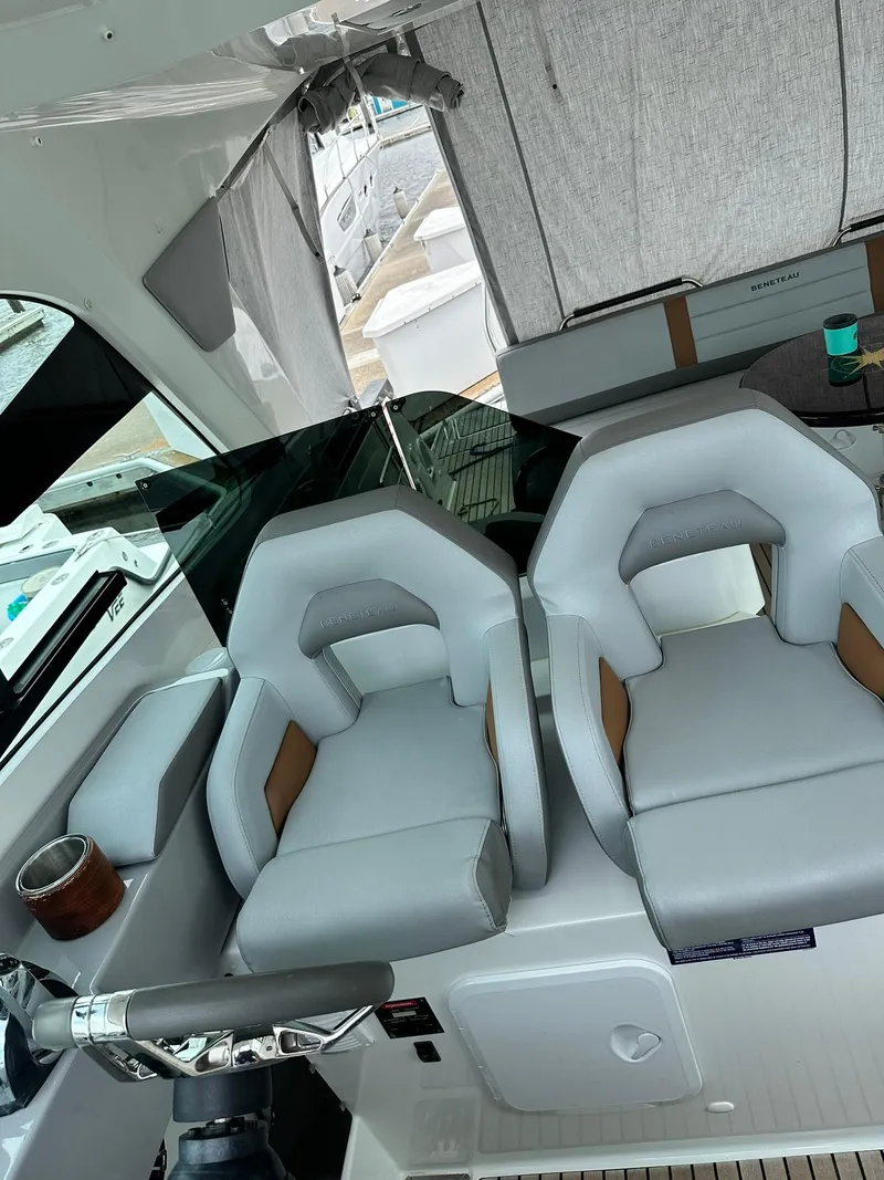 Slide: The Image of 2021 Beneteau GT 32 interior with modern seating and sleek design. - 31