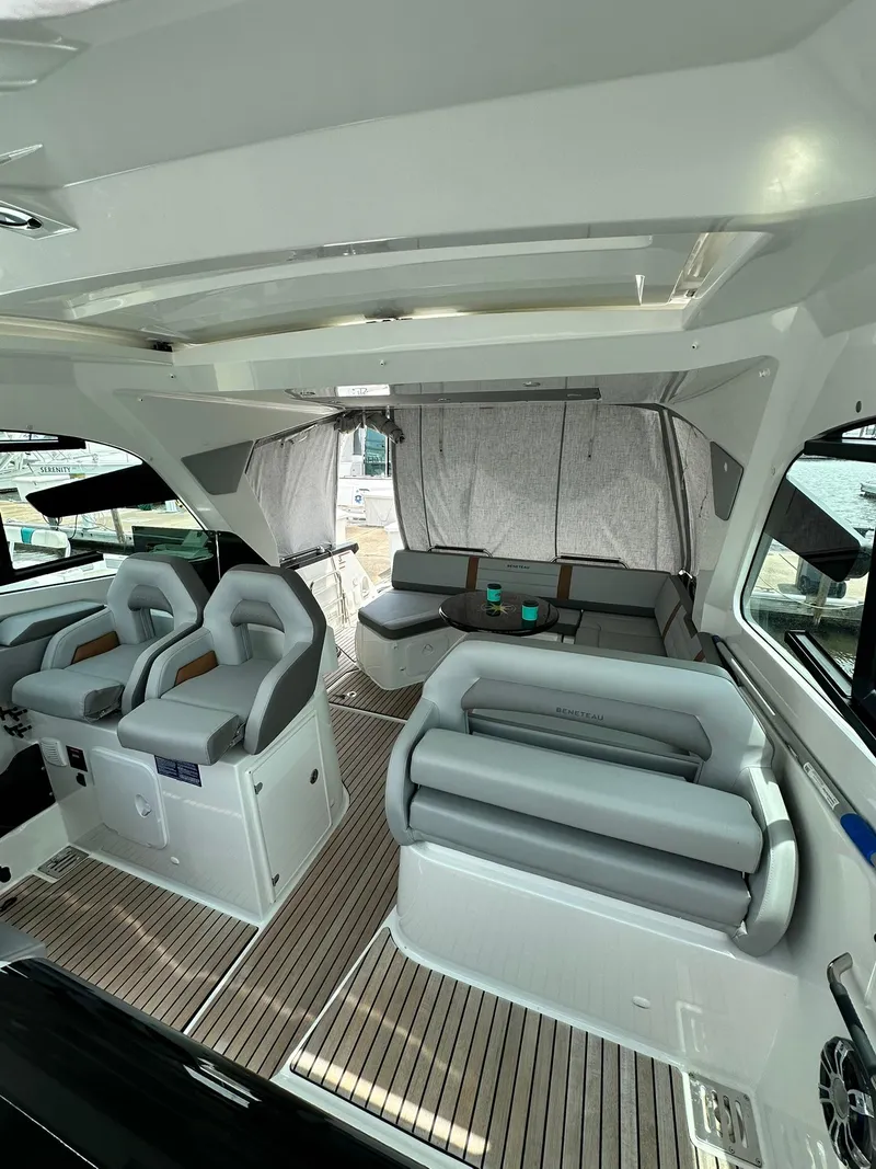 Slide: The Image of 2021 Beneteau GT 32 interior with modern seating and sleek design. - 41
