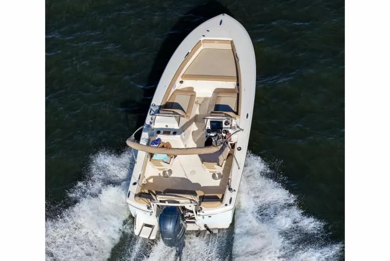 Slide: The Image of Manufacturer Provided Image: 2025 Scout 195 Sport Dorado boat cruising on water, aerial view. - 3