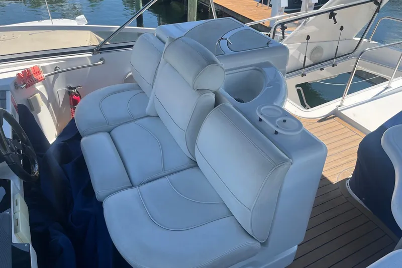 Slide: The Image of Luxury seating on 2000 Cruisers Yachts 5000 Sedan Sport boat deck. - 4