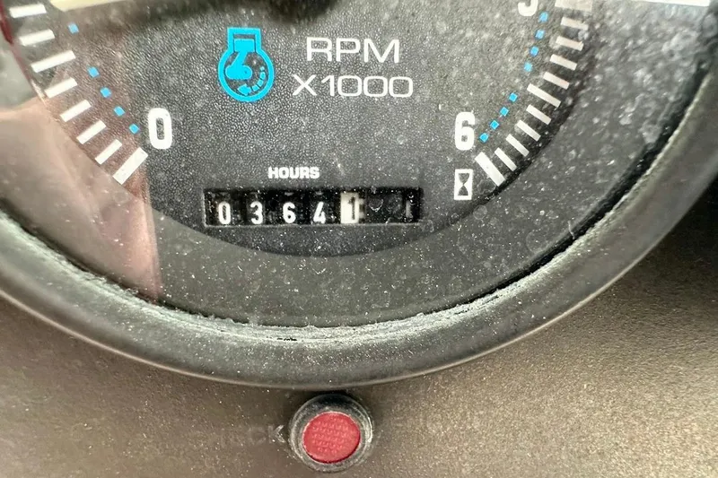 Slide: The Image of Close-up of a 1998 MasterCraft SportStar 19 RPM gauge showing 364 hours. - 26