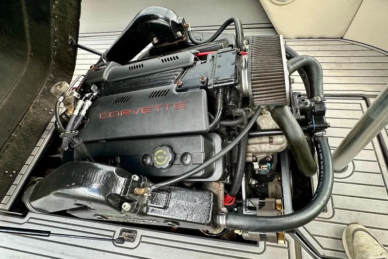 Slide: The Image of 1998 MasterCraft SportStar 19 boat engine with Corvette branding, showcasing detailed components. - 30