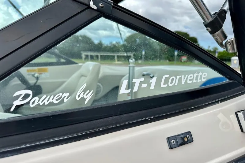 Slide: The Image of 1998 MasterCraft SportStar 19 boat window with "Power by LT-1 Corvette" decal. - 7