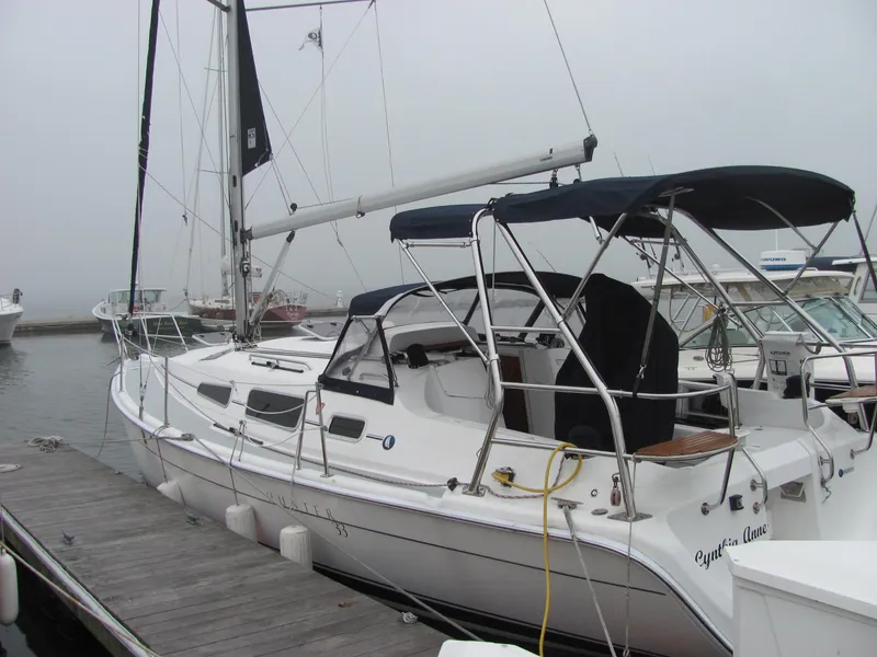 Slide: The Image of 2008 Hunter 33 sailboat docked at marina. - 6