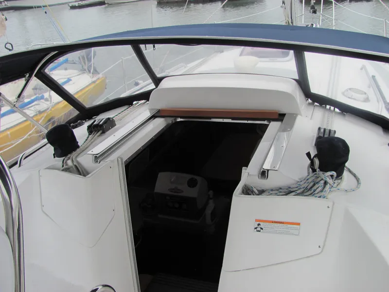 Slide: The Image of Cockpit of a 2008 Hunter 33 sailboat in harbor. - 8