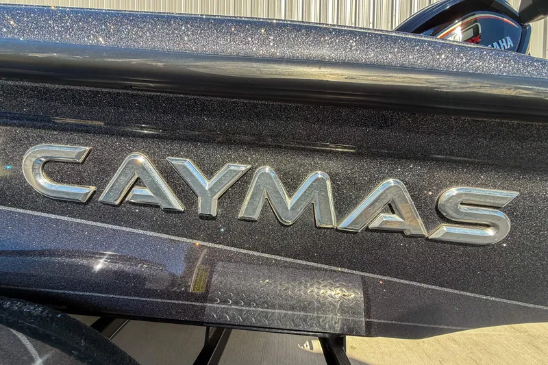 Slide: The Image of 2023 Caymas CX 21 PRO boat with metallic finish and logo detail. - 3