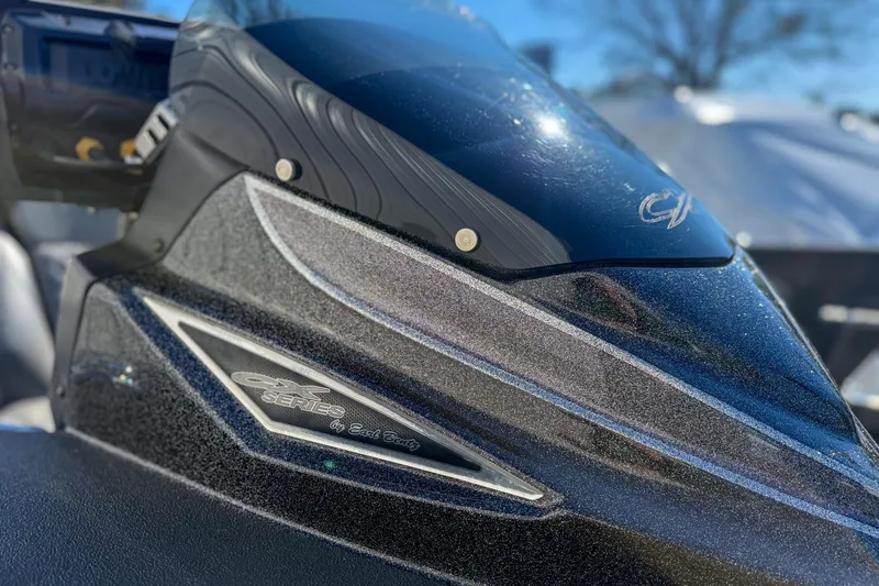 Slide: The Image of 2023 Caymas CX 21 PRO boat dashboard close-up with sleek design details. - 9