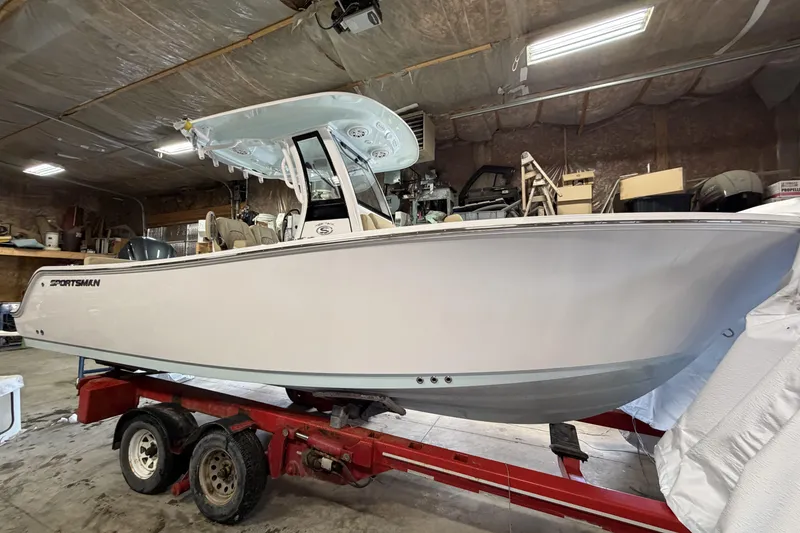 The Image of 2026 Sportsman Heritage 231 Center Console boat in a workshop setting. - 0
