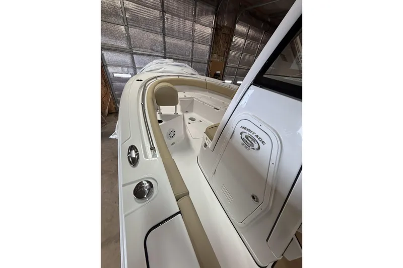 Slide: The Image of 2026 Sportsman Heritage 231 Center Console boat interior, featuring sleek design and comfortable seating. - 11