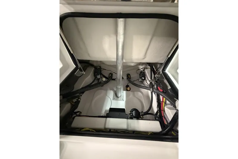 Slide: The Image of 2026 Sportsman Heritage 231 Center Console interior wiring and components view. - 13