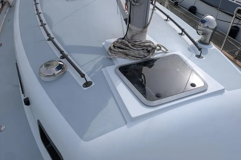 Slide: The Image of 1980 Island Trader 38 sailboat deck with hatch and rigging details. - 39