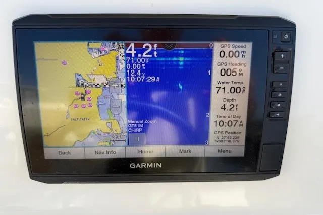 Slide: The Image of Garmin GPS display on a 2019 Mako 214 Center Console boat, showing navigation and depth data. - 14