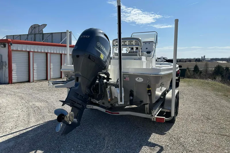 Slide: The Image of 2022 BayRider Kencraft 219 Bay boat with Yamaha 150 engine on trailer. - 1