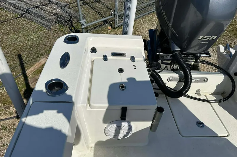 Slide: The Image of 2022 BayRider Kencraft 219 Bay boat with Yamaha 150 engine, featuring deck and storage compartments. - 16