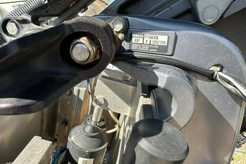 Slide: The Image of Close-up of Yamaha F150XB engine part on 2022 BayRider Kencraft 219 Bay boat. - 23
