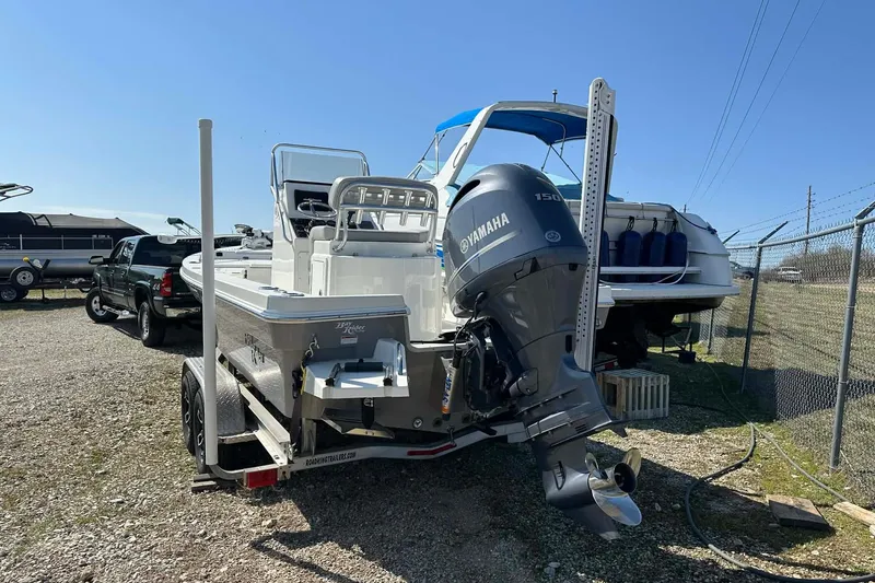 Slide: The Image of 2022 BayRider Kencraft 219 Bay boat with Yamaha outboard motor on trailer. - 25