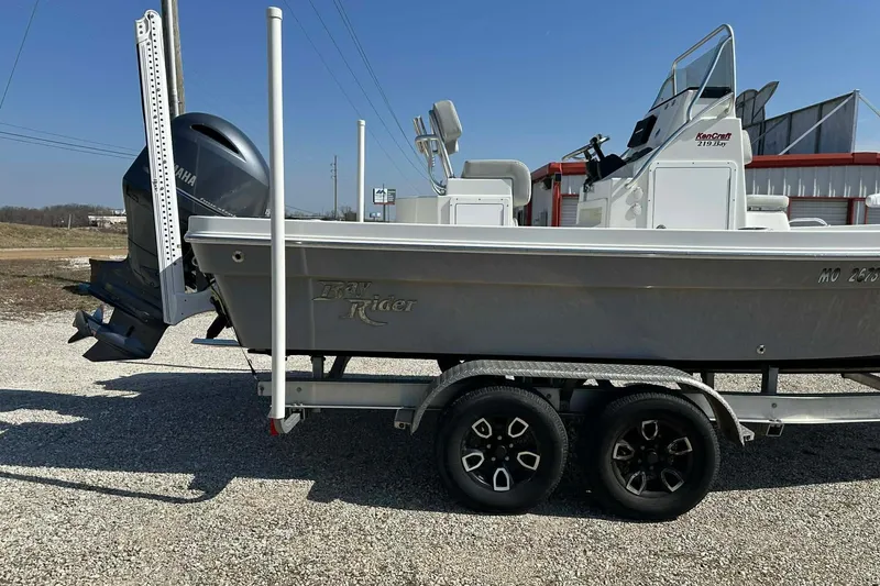 Slide: The Image of 2022 BayRider Kencraft 219 Bay boat on trailer, side view. - 30