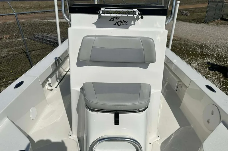 Slide: The Image of 2022 BayRider Kencraft 219 Bay boat interior with seating and console. - 34