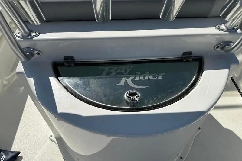 Slide: The Image of 2022 BayRider Kencraft 219 Bay boat console with logo and rod holders. - 38