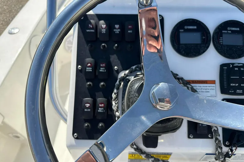 Slide: The Image of Steering wheel and control panel of 2022 BayRider Kencraft 219 Bay boat. - 46