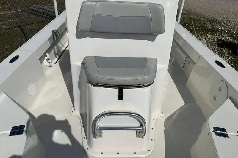 Slide: The Image of 2022 BayRider Kencraft 219 Bay boat interior with gray seating and stainless steel grab rail. - 5