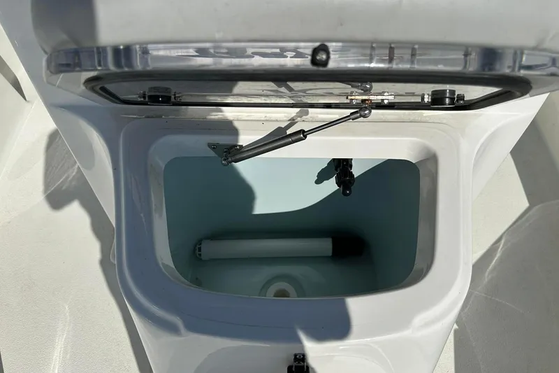 Slide: The Image of Open storage compartment on 2022 BayRider Kencraft 219 Bay boat. - 7