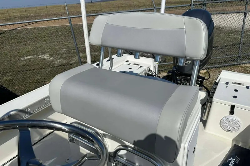 Slide: The Image of BayRider Kencraft 219 Bay 2022 boat seat and steering wheel, outdoor setting. - 8