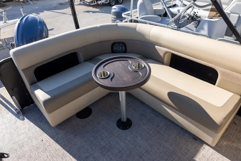 Slide: The Image of 2024 Premier 230 Sunsation RE boat dashboard with steering wheel and gauges. - 6