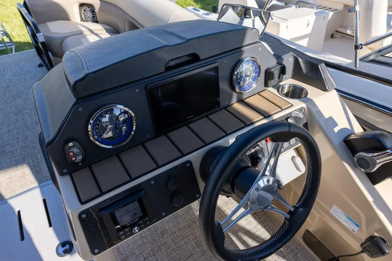 Slide: The Image of Captain's chair on 2024 Premier 230 Sunsation RE boat, showcasing luxury and comfort. - 7