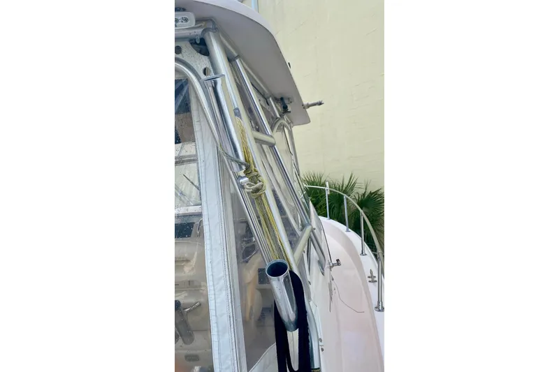 Slide: The Image of 2007 Grady-White Marlin 300 boat with stainless steel railings and cockpit view. - 10