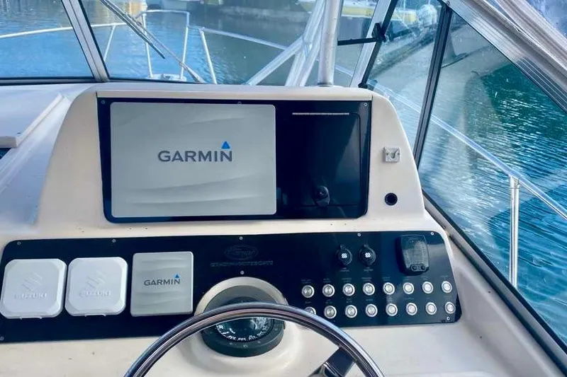 Slide: The Image of Helm of 2007 Grady-White Marlin 300 with Garmin navigation system. - 7