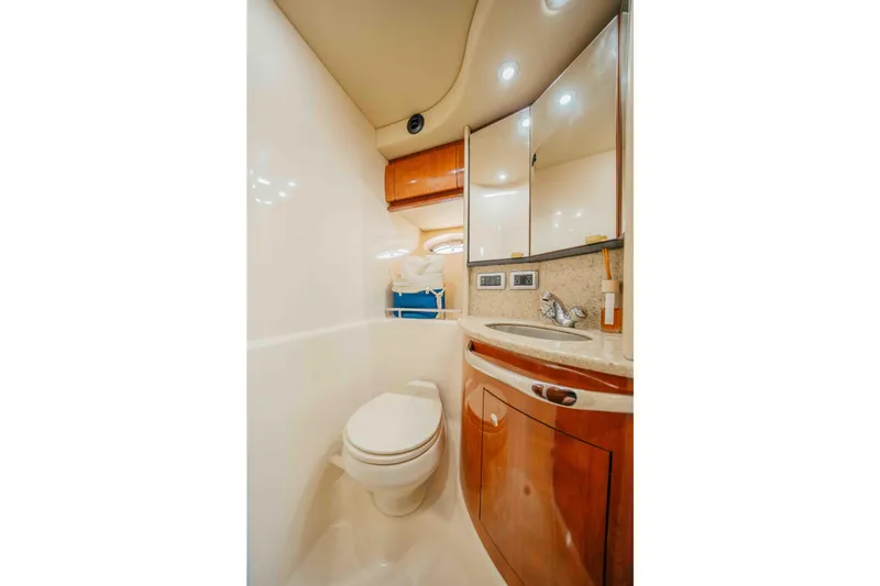 Slide: The Image of Luxurious interior of 2003 Sea Ray 420 Sundancer yacht with elegant wood finishes. - 11