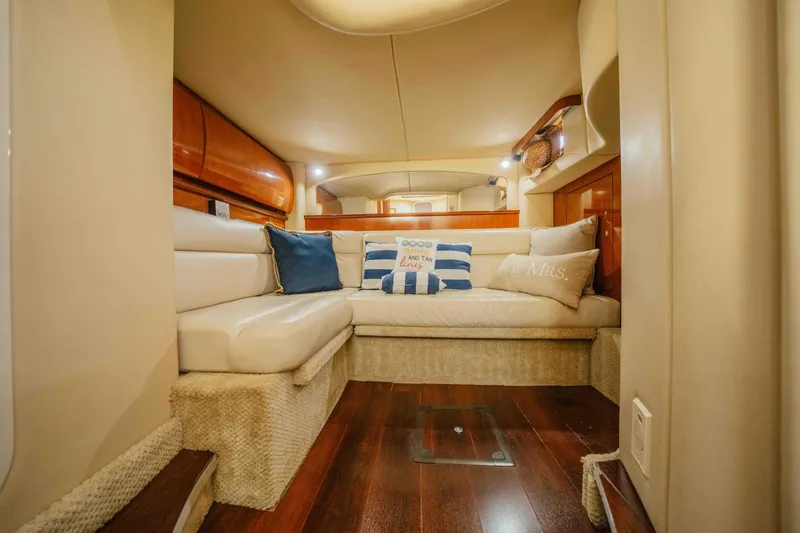 Slide: The Image of 2003 Sea Ray 420 Sundancer yacht cruising on a sunny lake. - 6