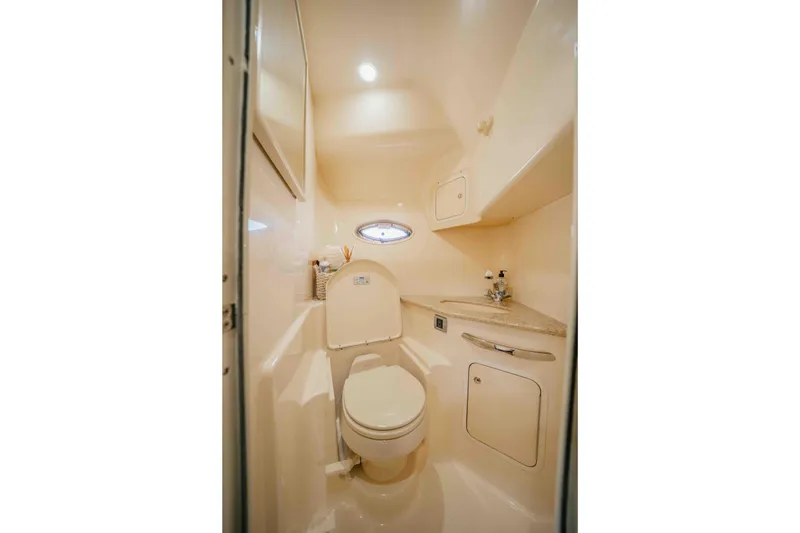 Slide: The Image of Luxurious interior of 2003 Sea Ray 420 Sundancer yacht with elegant wood finishes. - 9