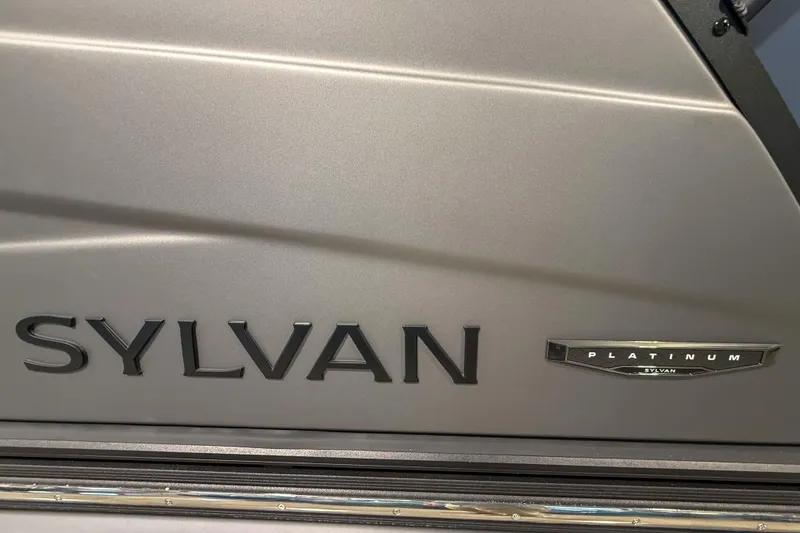 Slide: The Image of 2026 Sylvan G3 LZ DH boat with Platinum badge on metallic surface. - 3