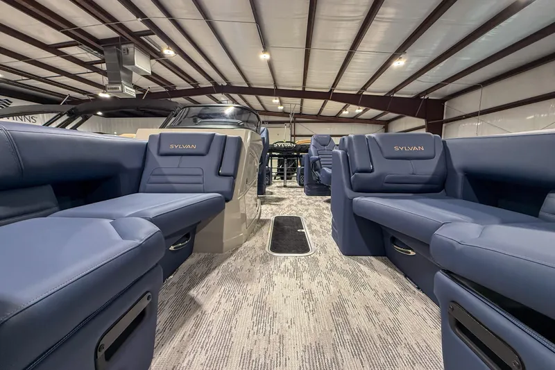 Slide: The Image of Interior view of 2026 Sylvan G3 LZ DH boat with luxurious seating. - 4
