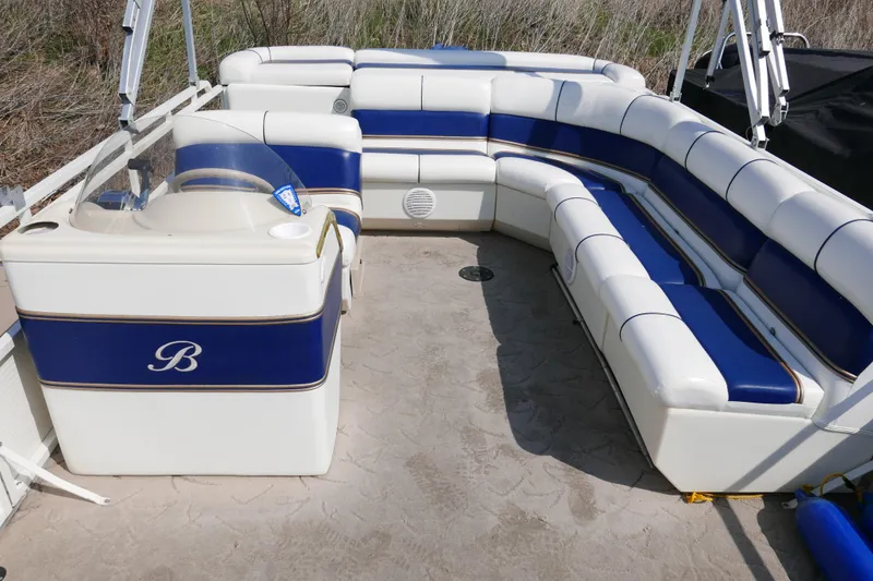 Slide: The Image of 2005 Bentley Pontoons 200 CRUISE interior with blue and white seating arrangement. - 7