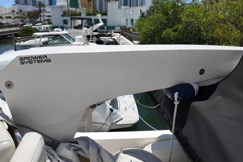Slide: The Image of Boat deck with Brower Systems equipment, featuring a 2003 Navigator Rival model in a marina setting. - 11