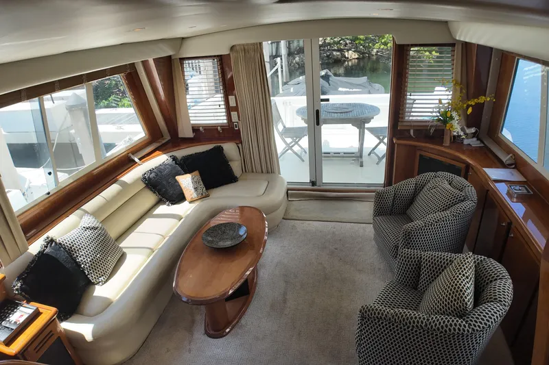 Slide: The Image of Luxurious 2003 Navigator Rival yacht interior with plush seating and elegant decor. - 14