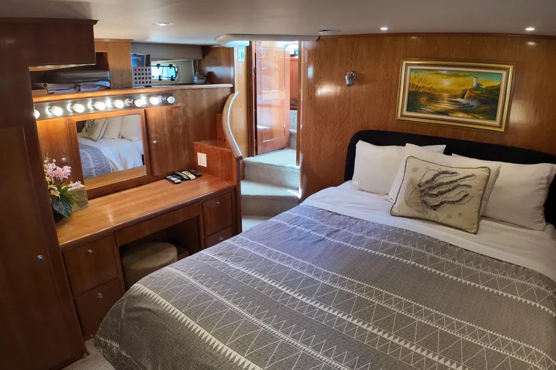 Slide: The Image of Luxurious 2003 Navigator Rival yacht bedroom with elegant decor and cozy bedding. - 31