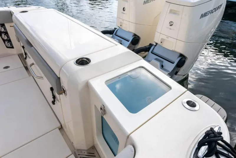 Slide: The Image of Manufacturer Provided Image: 2025 Scout 377 LXF boat deck with dual Mercury engines. - 12