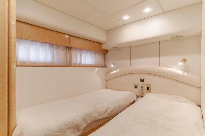 Slide: The Image of Luxurious twin cabin interior of 1997 Viking Sport Cruisers 66 Motor Yacht. - 11